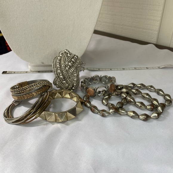 Jewelry - Unique group of six chic silvertone bracelets